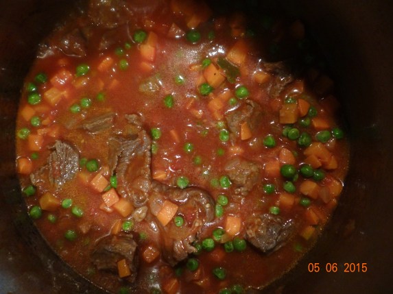 Beef stew with peas and carrots