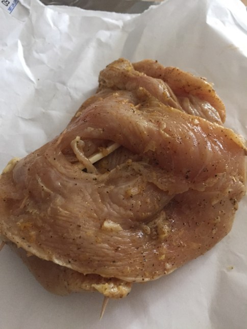 Chicken surgery with toothpicks to close all ends.