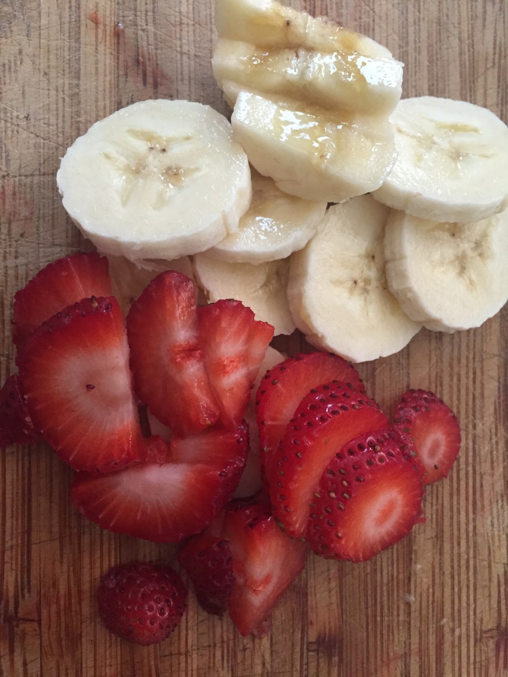 sliced strawberries and bananas
